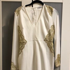 Brand new white and gold dress size small.